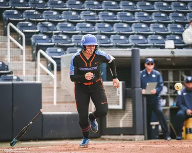 Mykenzie Hanna runs to first base after a hit against BYU, March 21.