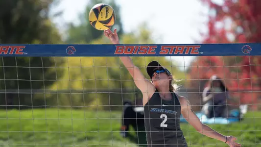 Rori Chartier hits the ball over the net at the Boise State Pairs Classic.