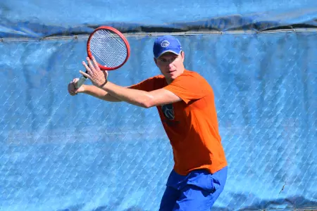 Michael Bott returns a shot at the Dar Walters Classic in 2022.