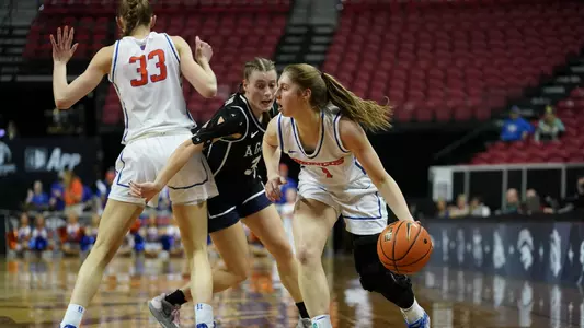 Mya Hansen dribbles to the basket in the first round of the MW Tournament against Utah State (3-5-23)
