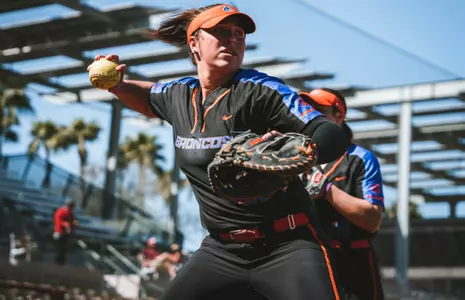 Serena Huchingson throwing during warm ups in the 2023 season.