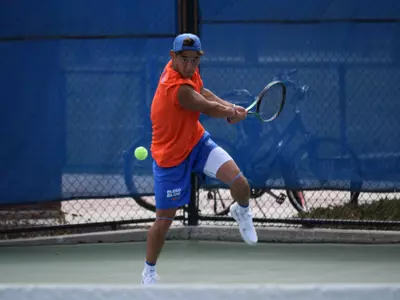 Photo, Ryo Minakata returns a volley against Air Force on April 8, 2023.