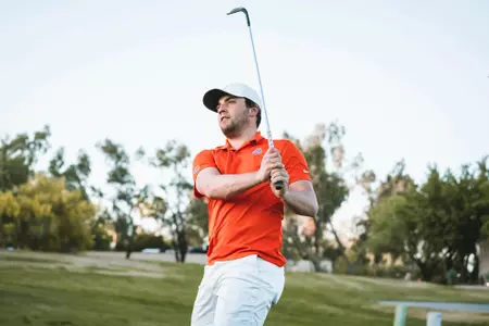 Alex Talbot sends a shot down the fairway.