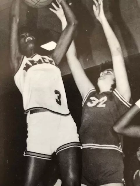 Lesley Slaton Brown photo from high school playing basketball.