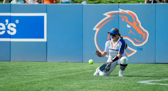 Mykenzie Hanna catching a ball in the outfield at Dona Larsen Park against San Diego State, April 28, 2023.