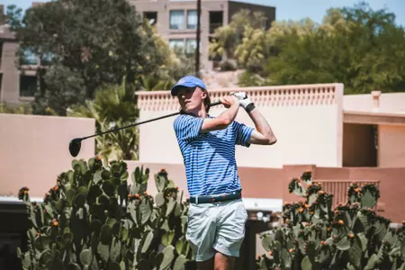 Gavyn Knight tracks his tee shot at the Mountain West Championship.