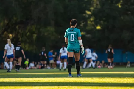 Genevieve Crenshaw 2023 Action shots against College of Idaho in a 2023 exhibition match.