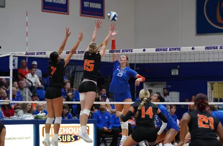 Paige Bartsch hits over the block against Idaho State on August 25, 2023.