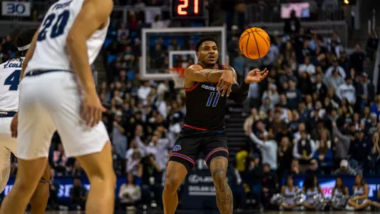 Chibuzo Agbo passes the ball against Nevada.