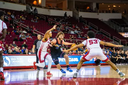 Max Rice drives the ball into the paint at Fresno State