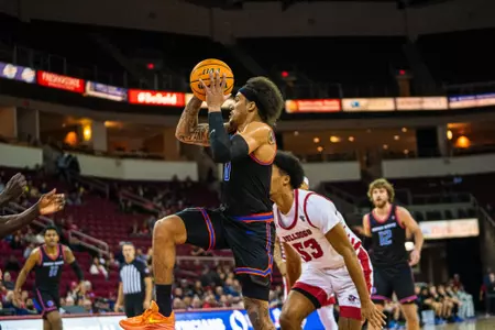 Roddie Anderson III drives the ball to the rim at Fresno State