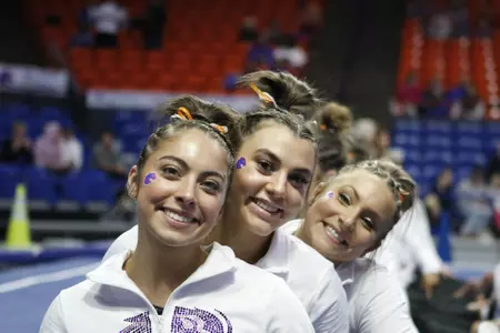 Photo of Emily Lopez, Alyssa Vulaj and Adriana Popp before closing ceremony.