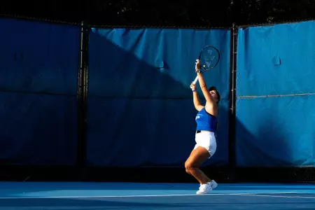 Paula Schaefer hitting a serve in the Barb Chandler Classic