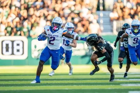 Ashton Jeanty stiff arming Hawai'i defender