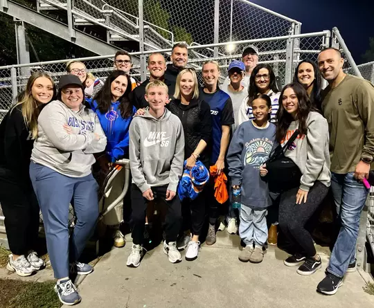 Avery McBride and her family after a home match.