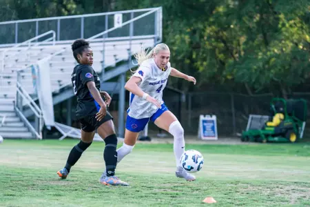 Avery McBride chasing after the ball.