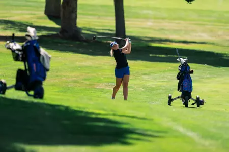 Macee Greenwood practicing before a Boise State golf tournament