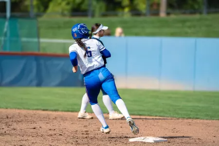 Megan Lake rounds second base in fall softball game against Eastern Oregon