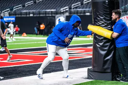 Herbert Gums warming up during No.17 Boise State's 29-24 victory over UNLV on Oct. 25, 2024. Photo by Kenna Harbison.