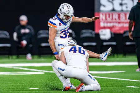 Jonah Dalmas and James Ferguson-Reynolds warming up during No.17 Boise State's 29-24 victory over UNLV on Oct. 25, 2024. Photo by Kenna Harbison.