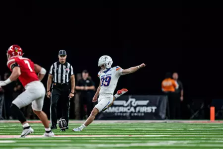 Taren Schive kicks off during No.17 Boise State's 29-24 victory over UNLV on Oct. 25, 2024. Photo by Kenna Harbison.