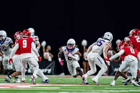 Ashton Jeanty rushing the ball during No.17 Boise State's 29-24 victory over UNLV on Oct. 25, 2024. Photo by Kenna Harbison.