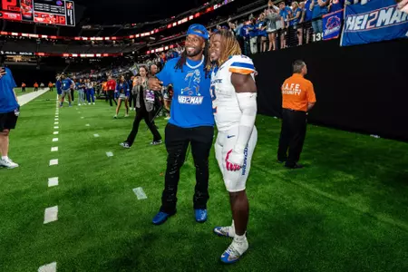 Former Bronco running back Alexander Mattison and Ashton Jeanty pose postgame during No.17 Boise State's 29-24 victory over UNLV on Oct. 25, 2024. Photo by Kenna Harbison.