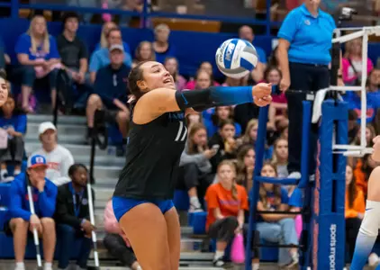 Bre Mitchell digs the ball during the Air Force match in Boise on October 3, 2024.