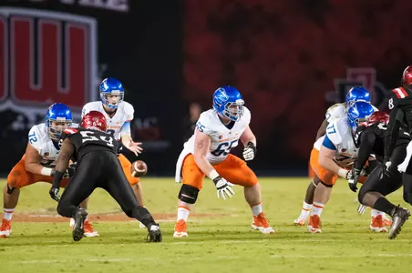 Matt Paradis snapping the football.
