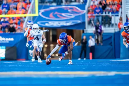 Ty Benefield recovers a fumble as No. 21 Boise State defeated Utah State 62-30 in the conference opener at Albertsons Stadium on Oct. 5, 2024. (Photo by Kenna Harbison).