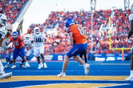Austin Bolt catches a touchdown as as No. 21 Boise State defeated Utah State 62-30 in the conference opener at Albertsons Stadium on Oct. 5, 2024. (Photo by Kenna Harbison).