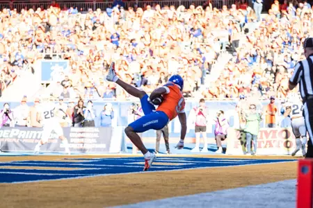 Cameron Camper makes a touchdown catch as No. 21 Boise State defeated Utah State 62-30 in the conference opener at Albertsons Stadium on Oct. 5, 2024. (Photo by Kenna Harbison).