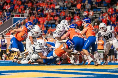 Jambres Dubar scores a touchdown as No. 21 Boise State defeated Utah State 62-30 in the conference opener at Albertsons Stadium on Oct. 5, 2024. (Photo by Kenna Harbison).