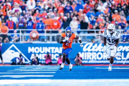 Ashton Jeanty rushes the ball as No. 21 Boise State defeated Utah State 62-30 in the conference opener at Albertsons Stadium on Oct. 5, 2024. (Photo by Kenna Harbison).