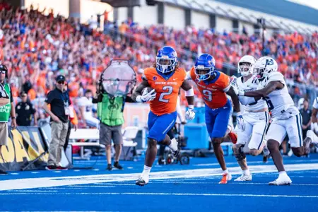 Ashton Jeanty rushes the ball as No. 21 Boise State defeated Utah State 62-30 in the conference opener at Albertsons Stadium on Oct. 5, 2024. (Photo by Kenna Harbison).