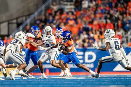 Ashton Jeanty rushes as No. 21 Boise State defeated Utah State 62-30 in the conference opener at Albertsons Stadium on Oct. 5, 2024. (Photo by Kenna Harbison).