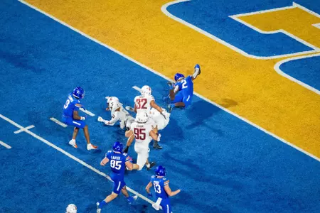 Ashton Jeanty dives for a touchdown against Washington State