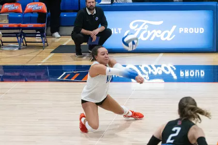 Bre Mitchell goes to one knee to get a dig during the Colorado State match on November 9, 2024.