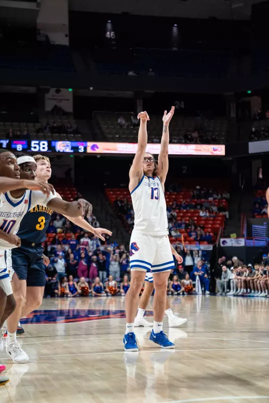 Andrew Meadow attempts a free throw vs Corban