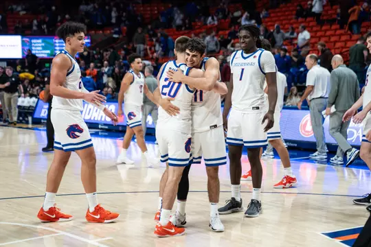 Brennan Ramirez is hugged a by a teammate vs Corban