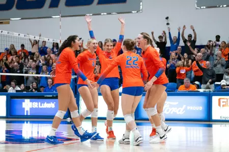 Team celebrates a point during the New Mexico match on October 5, 2024.