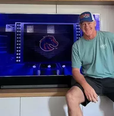 Libby Hutton's dad watching her game from their home in Australia
