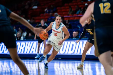 Milly Sharp drives to the basket against Bushnell