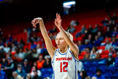 Mary Kay Naro attempting a 3-pointer against Eastern Oregon.