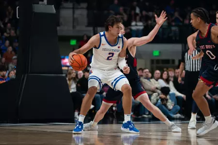 Tyson Degenhart posts up Saint Mary's defender