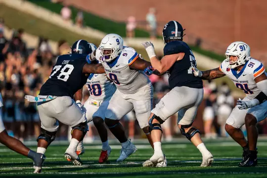 Sheldon Newton splits two blockers while rushing the passer at Georgia Southern.