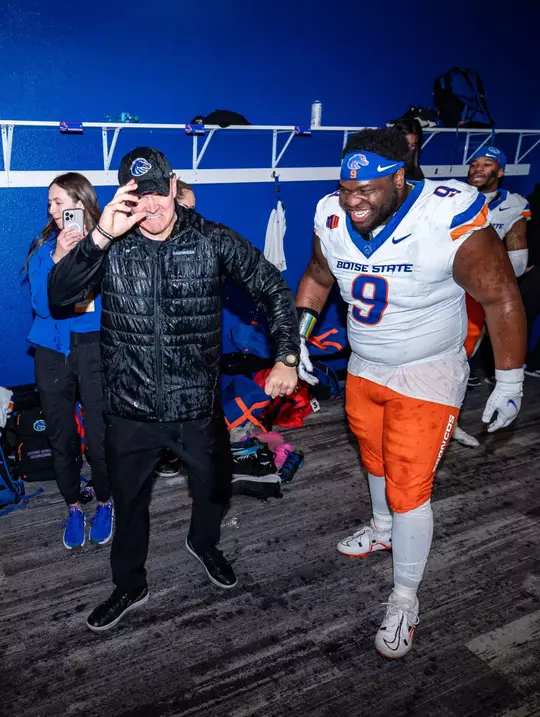 Spencer Danielson and Sheldon Newton celebrated win at San Jose State in locker room postgame