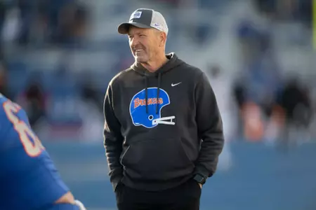 Dirk Koetter smiling during pregame warmups