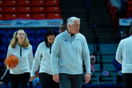 Head coach Gordy Presnell walks out ahead of the game against San Diego.