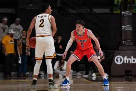 RJ Keene in a defensive stance against Wyoming